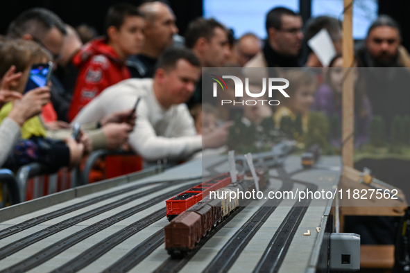 KRAKOW, POLAND - DECEMBER 01: 
Train enthusiasts and hobbyists gather at the Nowa Huta Cultural Center, where a 700 m2 space becomes a capti...