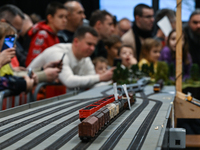 KRAKOW, POLAND - DECEMBER 01: 
Train enthusiasts and hobbyists gather at the Nowa Huta Cultural Center, where a 700 m2 space becomes a capti...