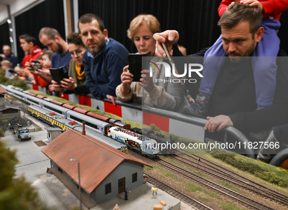 KRAKOW, POLAND - DECEMBER 01: 
Train enthusiasts and hobbyists gather at the Nowa Huta Cultural Center, where a 700 m2 space becomes a capti...