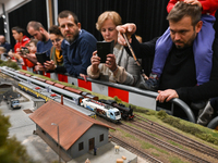 KRAKOW, POLAND - DECEMBER 01: 
Train enthusiasts and hobbyists gather at the Nowa Huta Cultural Center, where a 700 m2 space becomes a capti...