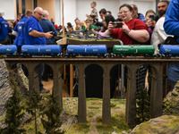 KRAKOW, POLAND - DECEMBER 01: 
Train enthusiasts and hobbyists gather at the Nowa Huta Cultural Center, where a 700 m2 space becomes a capti...