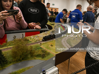 KRAKOW, POLAND - DECEMBER 01: 
Train enthusiasts and hobbyists gather at the Nowa Huta Cultural Center, where a 700 m2 space becomes a capti...