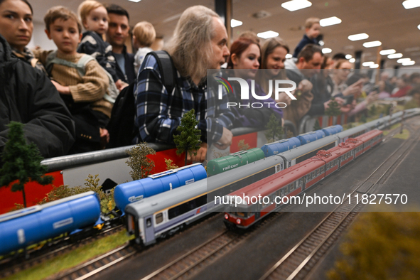 KRAKOW, POLAND - DECEMBER 01: 
Train enthusiasts and hobbyists gather at the Nowa Huta Cultural Center, where a 700 m2 space becomes a capti...