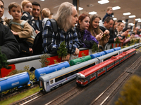 KRAKOW, POLAND - DECEMBER 01: 
Train enthusiasts and hobbyists gather at the Nowa Huta Cultural Center, where a 700 m2 space becomes a capti...