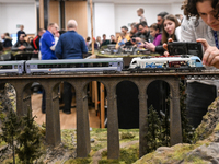 KRAKOW, POLAND - DECEMBER 01: 
Train enthusiasts and hobbyists gather at the Nowa Huta Cultural Center, where a 700 m2 space becomes a capti...