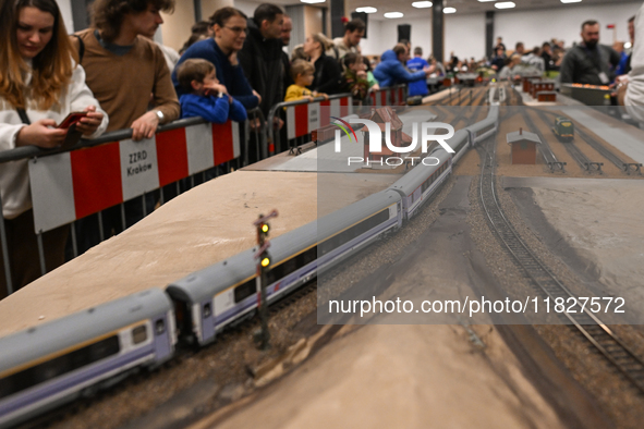 KRAKOW, POLAND - DECEMBER 01: 
Train enthusiasts and hobbyists gather at the Nowa Huta Cultural Center, where a 700 m2 space becomes a capti...