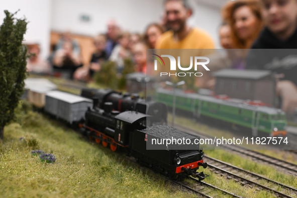 KRAKOW, POLAND - DECEMBER 01: 
Train enthusiasts and hobbyists gather at the Nowa Huta Cultural Center, where a 700 m2 space becomes a capti...