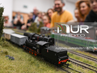 KRAKOW, POLAND - DECEMBER 01: 
Train enthusiasts and hobbyists gather at the Nowa Huta Cultural Center, where a 700 m2 space becomes a capti...