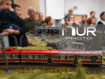 KRAKOW, POLAND - DECEMBER 01: 
Train enthusiasts and hobbyists gather at the Nowa Huta Cultural Center, where a 700 m2 space becomes a capti...