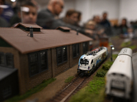 KRAKOW, POLAND - DECEMBER 01: 
Train enthusiasts and hobbyists gather at the Nowa Huta Cultural Center, where a 700 m2 space becomes a capti...