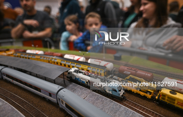 KRAKOW, POLAND - DECEMBER 01: 
Train enthusiasts and hobbyists gather at the Nowa Huta Cultural Center, where a 700 m2 space becomes a capti...