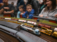 KRAKOW, POLAND - DECEMBER 01: 
Train enthusiasts and hobbyists gather at the Nowa Huta Cultural Center, where a 700 m2 space becomes a capti...