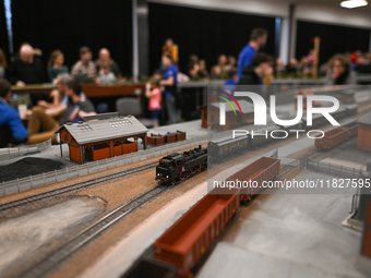 KRAKOW, POLAND - DECEMBER 01: 
Train enthusiasts and hobbyists gather at the Nowa Huta Cultural Center, where a 700 m2 space becomes a capti...