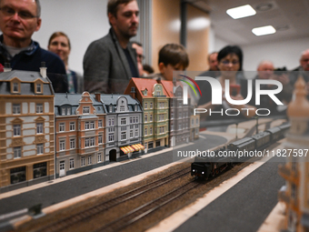 KRAKOW, POLAND - DECEMBER 01: 
Train enthusiasts and hobbyists gather at the Nowa Huta Cultural Center, where a 700 m2 space becomes a capti...