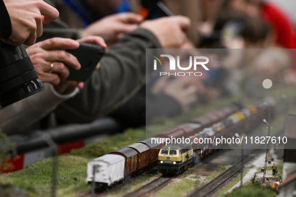 KRAKOW, POLAND - DECEMBER 01: 
Train enthusiasts and hobbyists gather at the Nowa Huta Cultural Center, where a 700 m2 space becomes a capti...