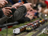 KRAKOW, POLAND - DECEMBER 01: 
Train enthusiasts and hobbyists gather at the Nowa Huta Cultural Center, where a 700 m2 space becomes a capti...