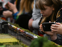 KRAKOW, POLAND - DECEMBER 01: 
Train enthusiasts and hobbyists gather at the Nowa Huta Cultural Center, where a 700 m2 space becomes a capti...