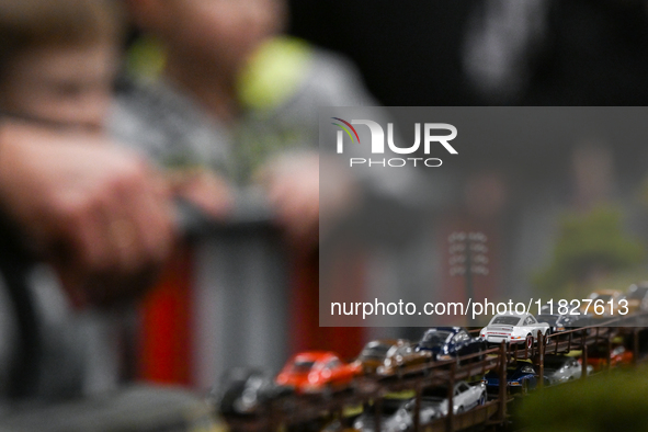 KRAKOW, POLAND - DECEMBER 01: 
Partial view of a freight train transporting cars as train enthusiasts and hobbyists gather at the Nowa Huta...