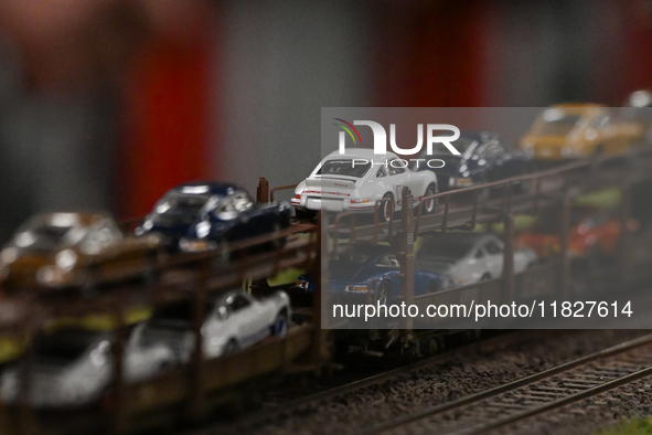 KRAKOW, POLAND - DECEMBER 01: 
Partial view of a freight train transporting new Porsche cars as train enthusiasts and hobbyists gather at th...