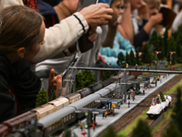 KRAKOW, POLAND - DECEMBER 01: 
Train enthusiasts and hobbyists gather at the Nowa Huta Cultural Center, where a 700 m2 space becomes a capti...