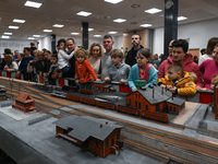 KRAKOW, POLAND - DECEMBER 01: 
Train enthusiasts and hobbyists gather at the Nowa Huta Cultural Center, where a 700 m2 space becomes a capti...