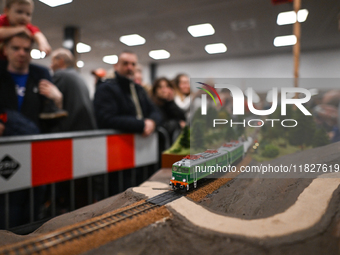 KRAKOW, POLAND - DECEMBER 01: 
A view of the locomotive ET41-130 B PKP as thousands of train enthusiasts and hobbyists gather at the Nowa Hu...