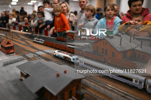 KRAKOW, POLAND - DECEMBER 01: 
Train enthusiasts and hobbyists gather at the Nowa Huta Cultural Center, where a 700 m2 space becomes a capti...