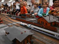 KRAKOW, POLAND - DECEMBER 01: 
Train enthusiasts and hobbyists gather at the Nowa Huta Cultural Center, where a 700 m2 space becomes a capti...