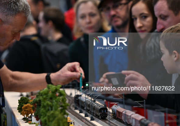 KRAKOW, POLAND - DECEMBER 01: 
Train enthusiasts and hobbyists gather at the Nowa Huta Cultural Center, where a 700 m2 space becomes a capti...