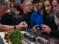 KRAKOW, POLAND - DECEMBER 01: 
Train enthusiasts and hobbyists gather at the Nowa Huta Cultural Center, where a 700 m2 space becomes a capti...