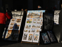 KRAKOW, POLAND - DECEMBER 01:   
A street stand at Krakow's Market Square featuring watercolor paintings of the city's iconic architecture a...