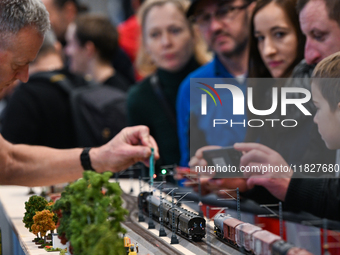 KRAKOW, POLAND - DECEMBER 1:   
Train enthusiasts and hobbyists gather at the Nowa Huta Cultural Center, where a 700 m2 space becomes a capt...