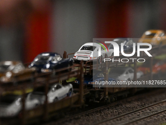 KRAKOW, POLAND - DECEMBER 01: 
Partial view of a freight train transporting cars as train enthusiasts and hobbyists gather at the Nowa Huta...