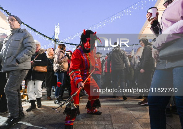 KRAKOW, POLAND - DECEMBER 01:   
A caroler dressed as a devil from a traditional caroling group in the Zielonki Commune, seen at the Christm...