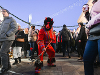 KRAKOW, POLAND - DECEMBER 01:   
A caroler dressed as a devil from a traditional caroling group in the Zielonki Commune, seen at the Christm...