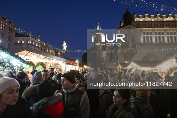 KRAKOW, POLAND - DECEMBER 01:   
A view of a bustling Christmas Market in Krakow's UNESCO-listed Market Square, featuring festive stalls and...