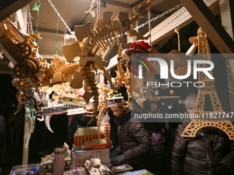 KRAKOW, POLAND - DECEMBER 01:   
A with wooden hand made toys on display at the Christmas Market in Krakow's UNESCO-listed Market Square, wi...