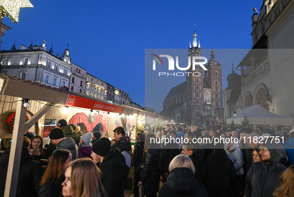 KRAKOW, POLAND - DECEMBER 01:   
A view of a bustling Christmas Market in Krakow's UNESCO-listed Market Square, featuring festive stalls and...