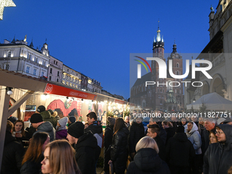 KRAKOW, POLAND - DECEMBER 01:   
A view of a bustling Christmas Market in Krakow's UNESCO-listed Market Square, featuring festive stalls and...