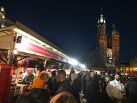 KRAKOW, POLAND - DECEMBER 01:   
A view a crowdy Christmas Market in Krakow's UNESCO-listed Market Square, with festive stalls and holiday d...