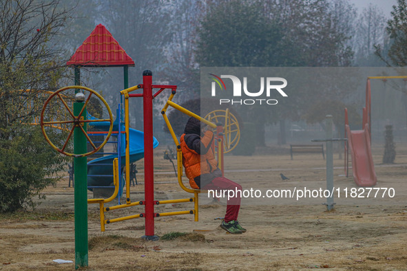 A man exercises at a park in Srinagar, Jammu and Kashmir, on December 02, 2024. Weather experts warn of heavy snowfall and a harsh winter in...