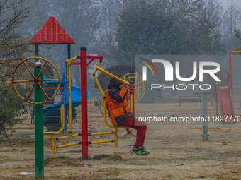 A man exercises at a park in Srinagar, Jammu and Kashmir, on December 02, 2024. Weather experts warn of heavy snowfall and a harsh winter in...