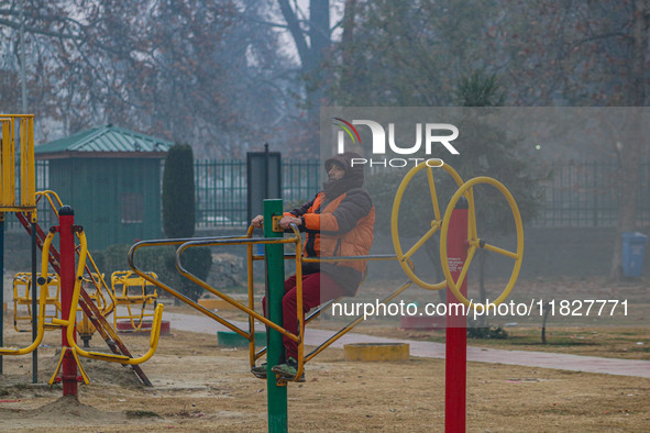 A man exercises at a park in Srinagar, Jammu and Kashmir, on December 02, 2024. Weather experts warn of heavy snowfall and a harsh winter in...