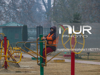 A man exercises at a park in Srinagar, Jammu and Kashmir, on December 02, 2024. Weather experts warn of heavy snowfall and a harsh winter in...