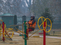 A man exercises at a park in Srinagar, Jammu and Kashmir, on December 02, 2024. Weather experts warn of heavy snowfall and a harsh winter in...