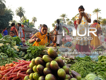 Women sell vegetables at a temporary open-air market in Samastipur, Bihar, India on november 29, 2024.(