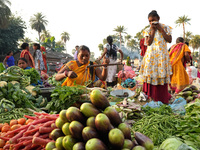 Women sell vegetables at a temporary open-air market in Samastipur, Bihar, India on november 29, 2024.(