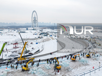 The construction site of the 26th Harbin Ice and Snow World is under construction in Harbin, China, on December 2, 2024. (