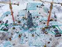 The construction site of the 26th Harbin Ice and Snow World is under construction in Harbin, China, on December 2, 2024. (