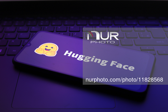 The Hugging Face logo appears on the screen of a smartphone in Reno, United States, on December 2, 2024. 